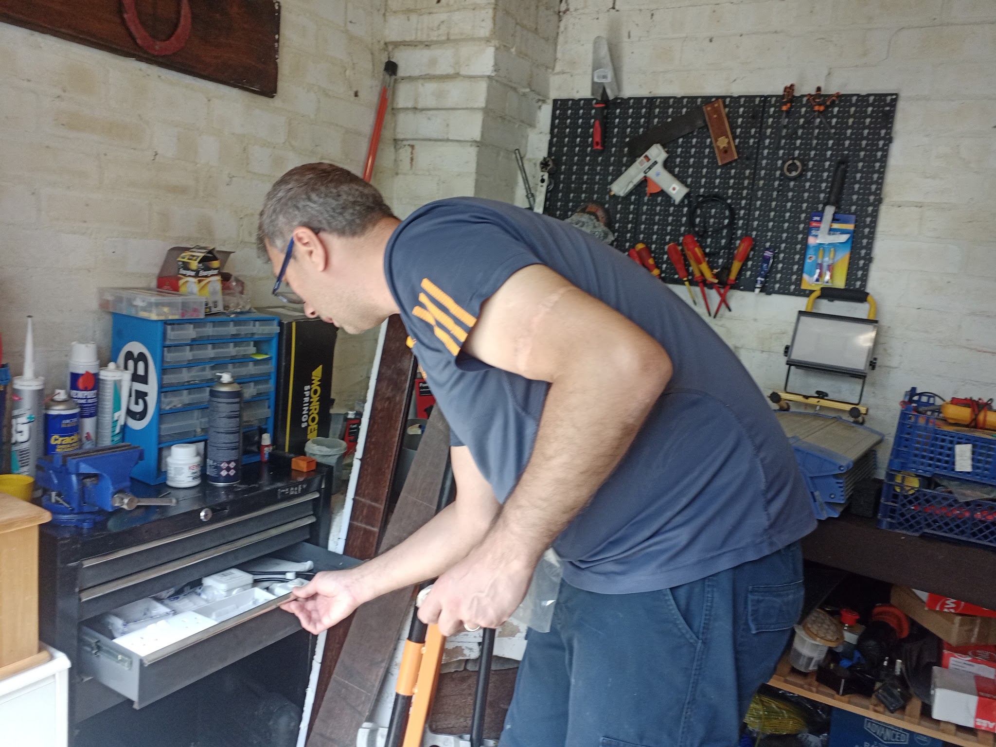 Our electrician at the workbench in the workshop